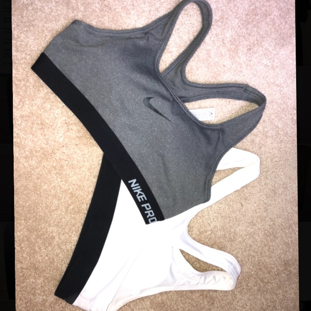 Two Nike pro patted sports bras